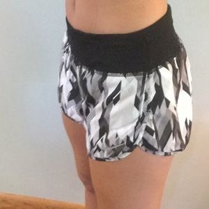 Women’s Nike running shorts, patterned size small